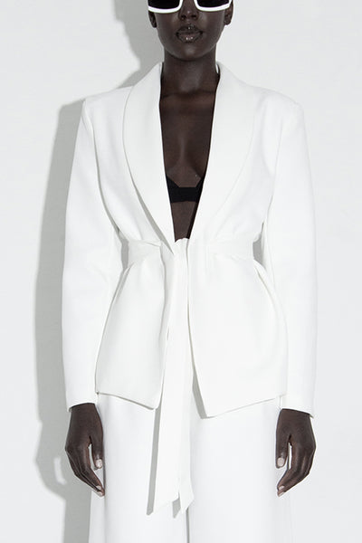 Model wearing our Calla white blazer front view close up.