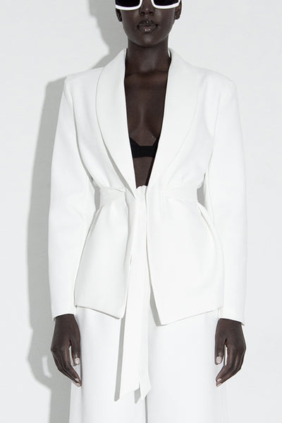 Model wearing our Calla white blazer front view close up.